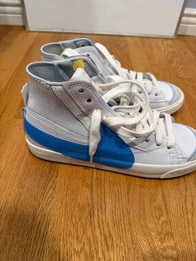 Nike Kids White High-Top Sneakers with Blue Swoosh